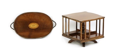 Lot 530 - An Edwardian walnut table top revolving bookcase