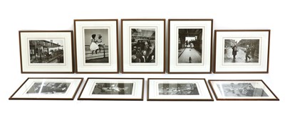 Lot 236 - A collection of eight monochrome photographs depicting 1950s genre scenes