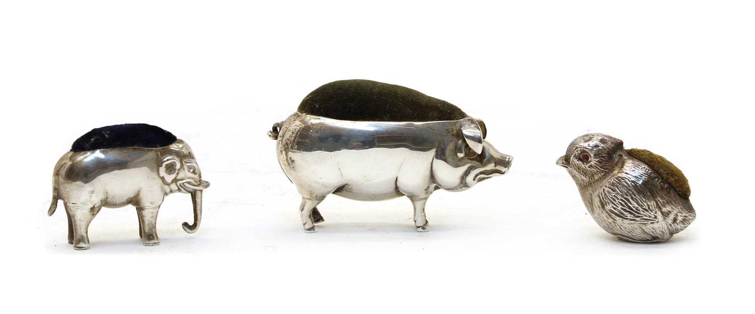 Lot 13 - A novelty silver pin cushion in the form of a pig