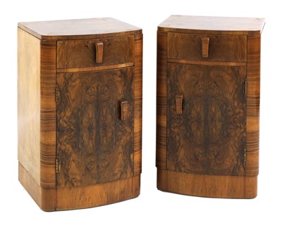 Lot 274 - A pair of Art Deco walnut bedside cabinets