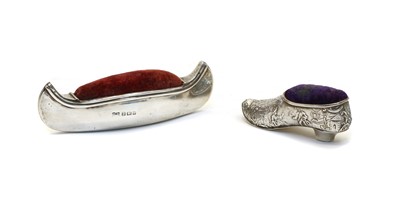 Lot 14 - A novelty silver pin cushion in the form of a canoe