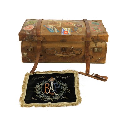 Lot 323 - A leather suitcase