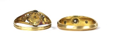 Lot 9 - A gold three stone diamond ring