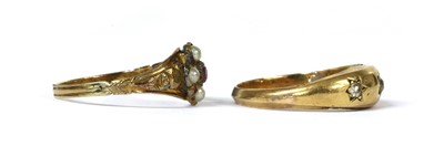 Lot 9 - A gold three stone diamond ring