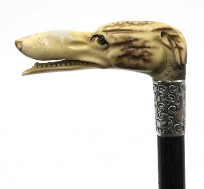 Lot 149 - A late Victorian bone and ebonised rosewood walking stick