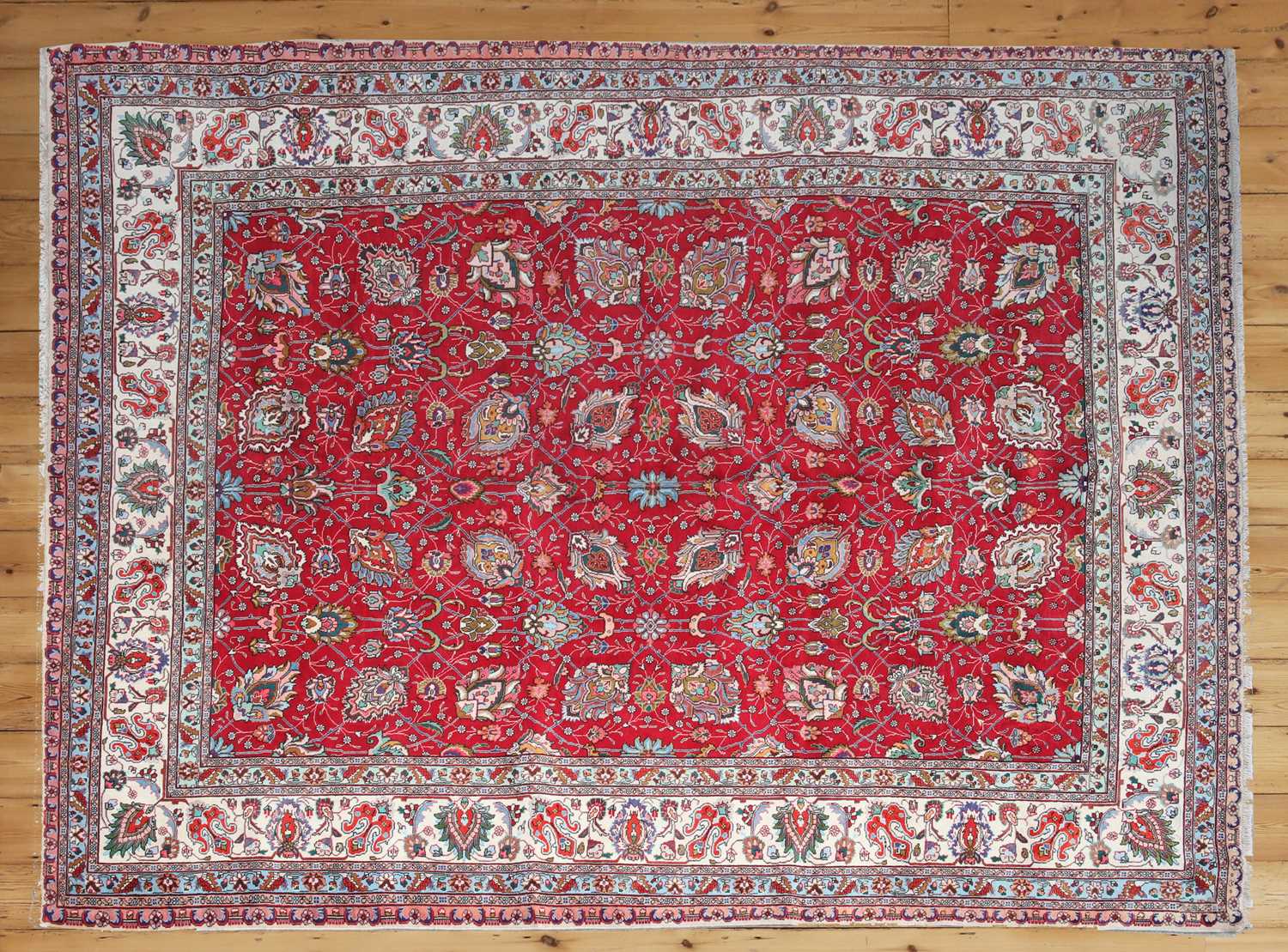 A Persian wool carpet Barnebys