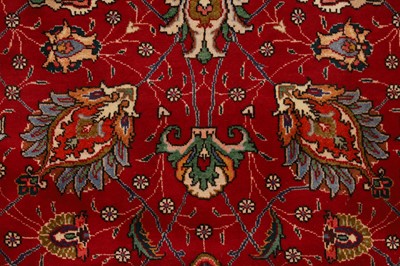 Lot 246 - A Tabriz wool carpet