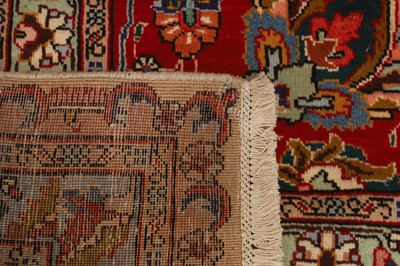 Lot 246 - A Tabriz wool carpet