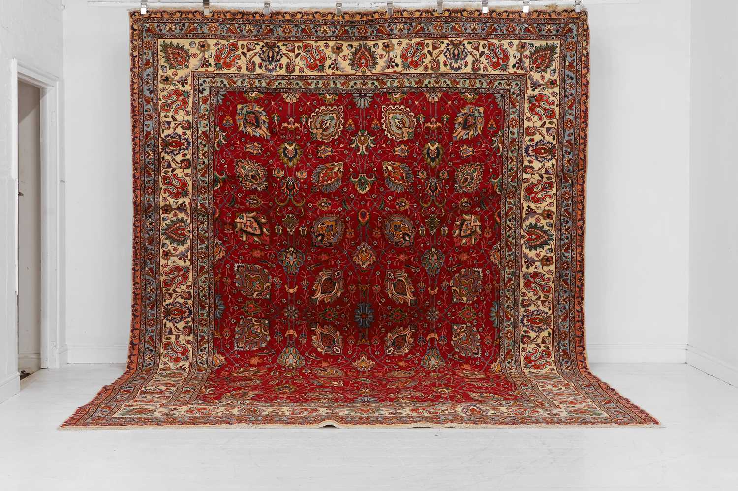 Lot 246 - A Tabriz wool carpet