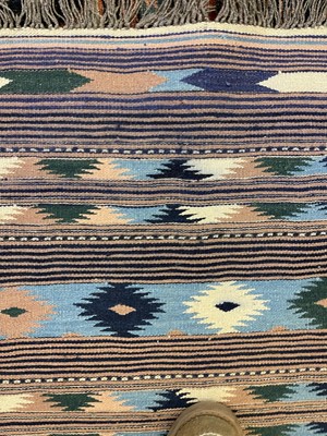 Lot 260 - A Persian kilim flatweave rug
