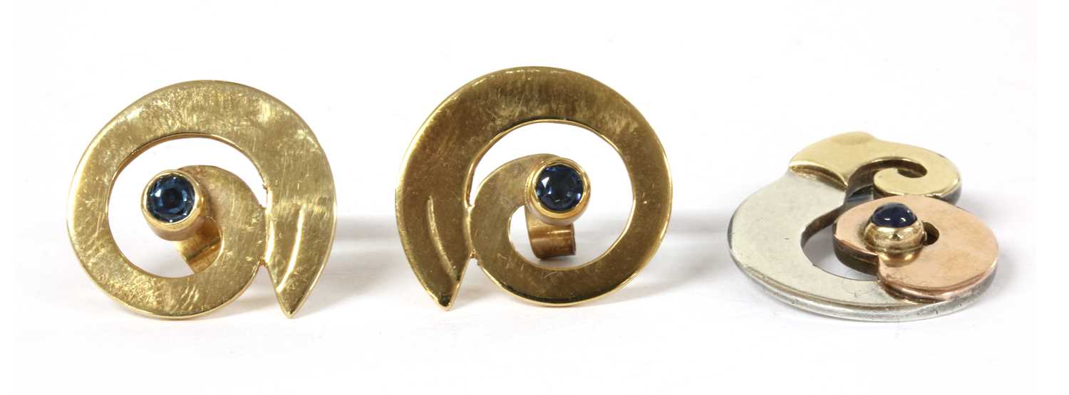 Lot 108 - A pair of 9ct gold sapphire set swirl earrings, by Harry Orkin