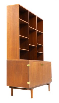 Lot 553 - A teak wall cabinet