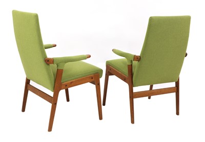 Lot 467 - A pair of teak armchairs