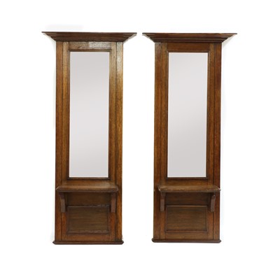 Lot 321 - A pair of early 20th century oak pier mirrors