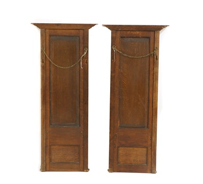 Lot 321 - A pair of early 20th century oak pier mirrors