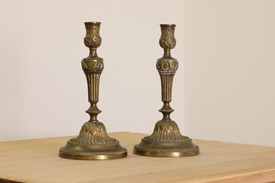 Lot 208 - A pair of French bronze candlesticks