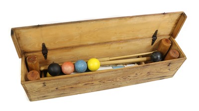 Lot 200 - An early 20th century croquet set