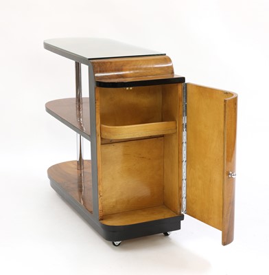 Lot 252 - An Art Deco walnut and ebonised stand