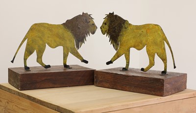 Lot 26 - A pair of painted folk art lions