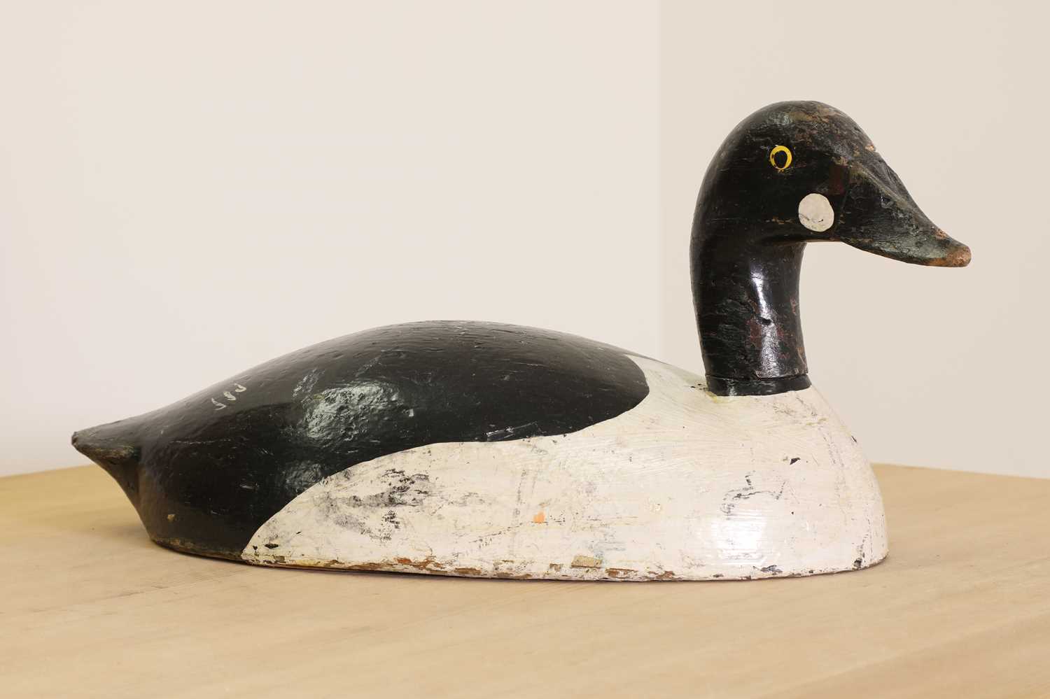 Lot 198 - A painted pine decoy duck