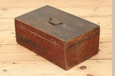 Lot 65 - A red leather and studded deeds box
