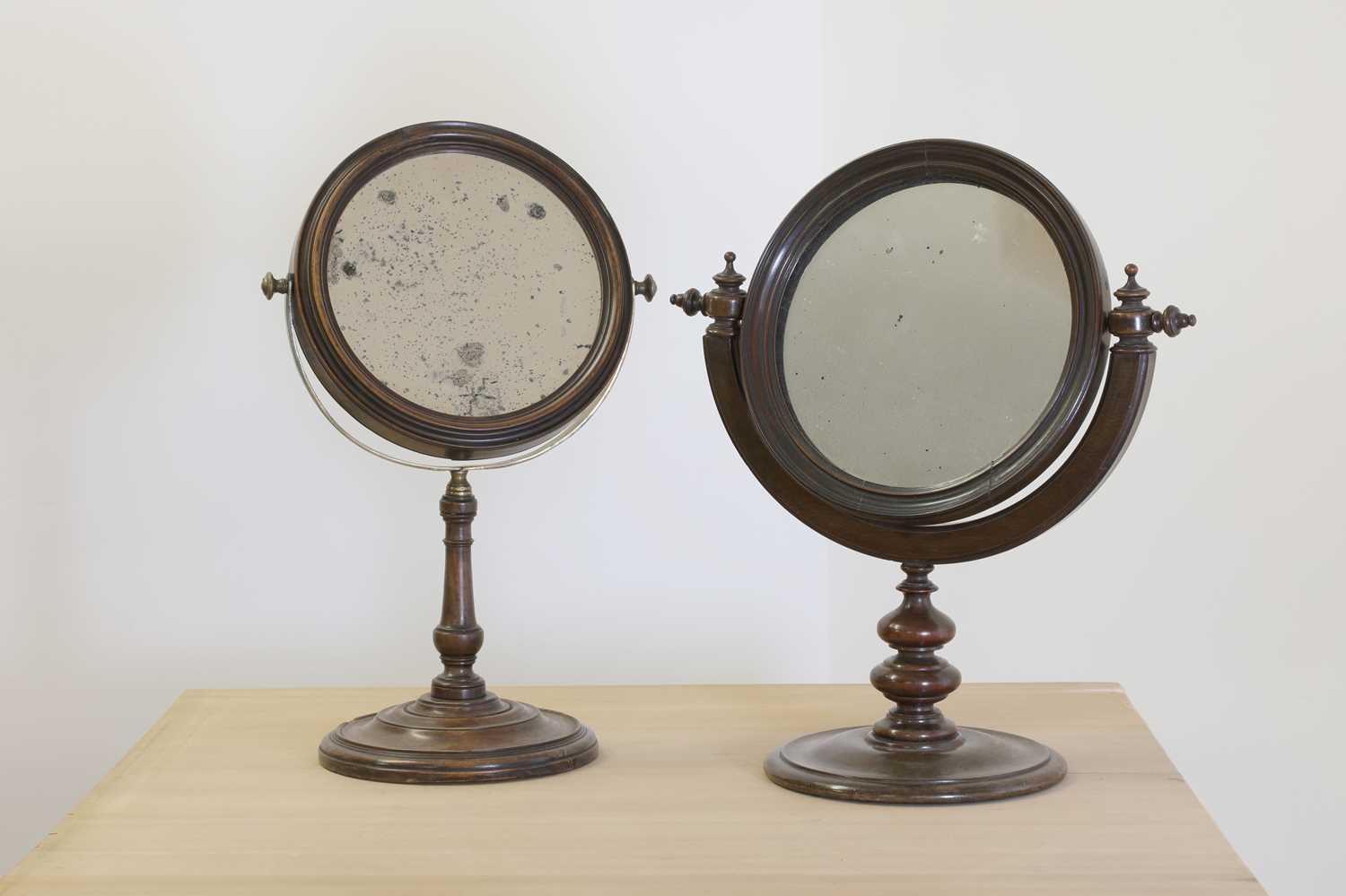 Lot 475 - A fruitwood convex shaving mirror