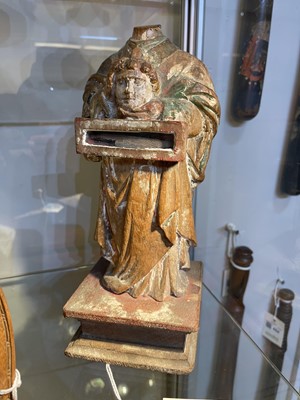Lot 395 - A carved wood reliquary figure of St Denis the Martyr