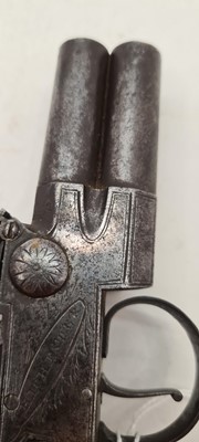 Lot 45 - A flintlock db over and under tap action pocket pistol