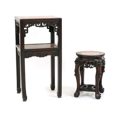 Lot 122 - A Chinese hardwood two tier stand