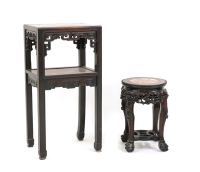 Lot 122 - A Chinese hardwood two tier stand