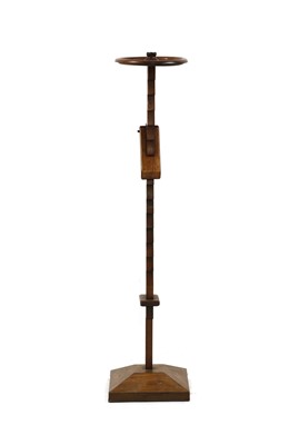Lot 295 - An early 20th century adjustable candle stand
