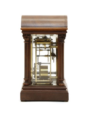 Lot 140 - A walnut and marquetry cased timepiece