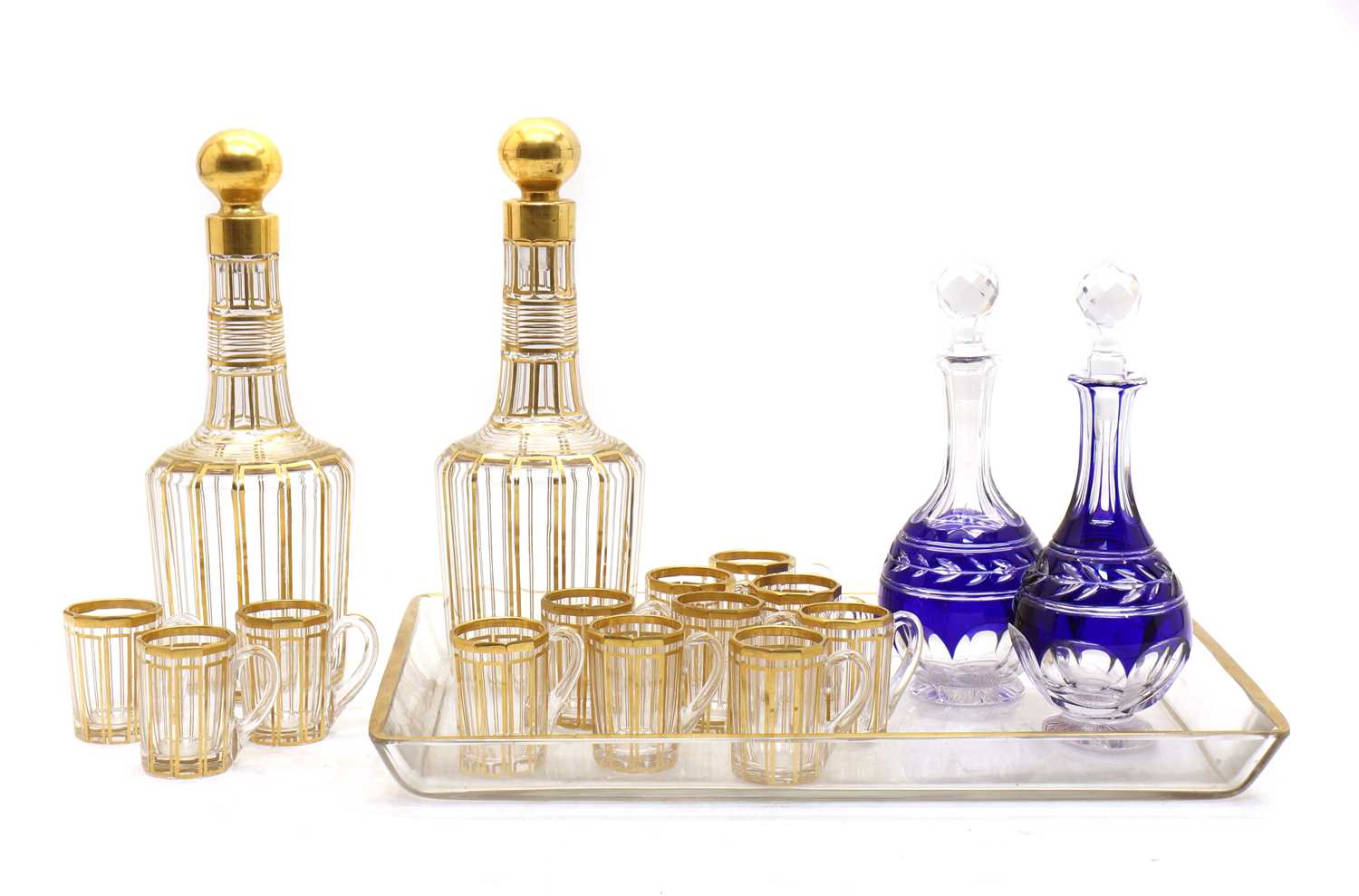 Lot 77 - A cut glass and gilt liqueur set