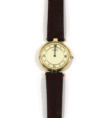 Lot 230 - A vermeil silver gilt Must de Cartier quartz strap watch