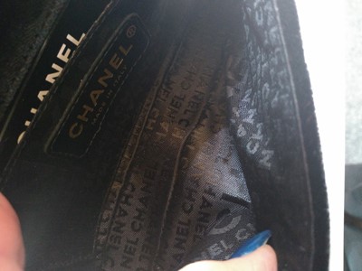 Lot 521 - A Chanel black velvet evening bag