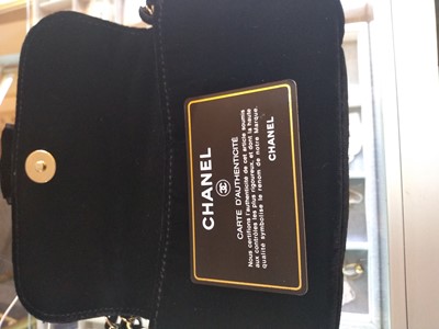 Lot 521 - A Chanel black velvet evening bag