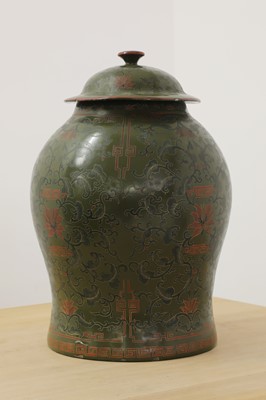 Lot 187 - A green-lacquered papier-mâché vase and cover