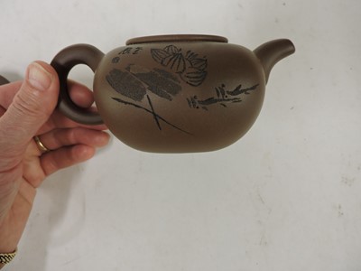 Lot 279 - A Yixing zisha teapot and cover