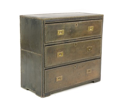 Lot 348 - A leather clad campaign style chest of drawers