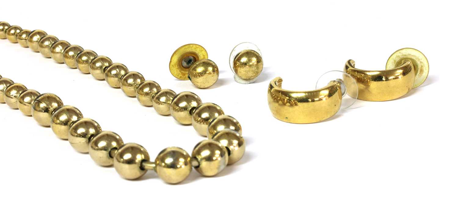 Lot 20 - A pair of Christian Dior gilt metal hoop earrings