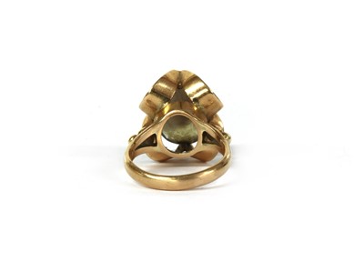 Lot 141 - A gold single stone smoky quartz ring
