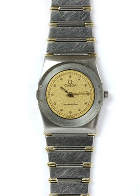 Lot 232 - A ladies' bi-colour Omega Constellation quartz bracelet watch