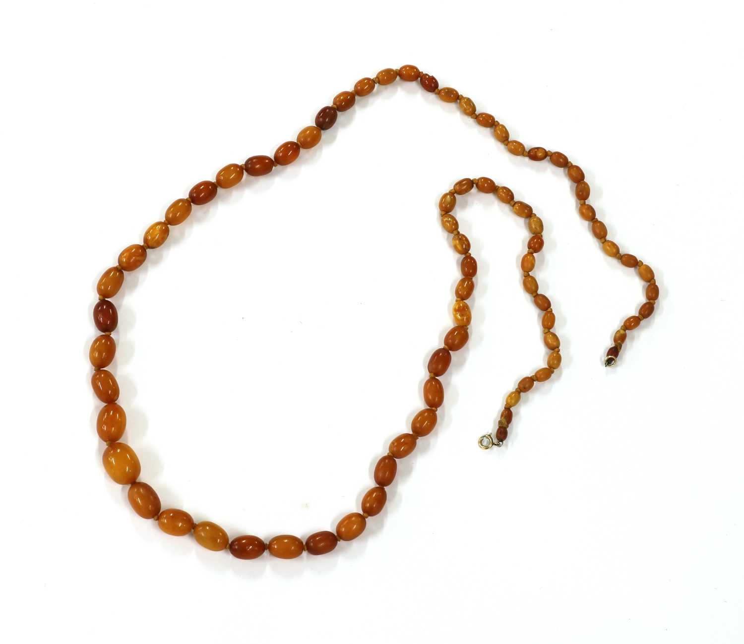 Lot 147 - A single row graduated butterscotch amber bead necklace
