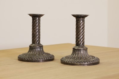 Lot 341 - A pair of George III silver candlesticks