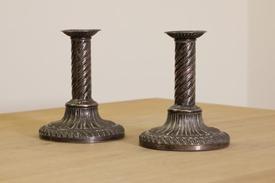 Lot 341 - A pair of George III silver candlesticks