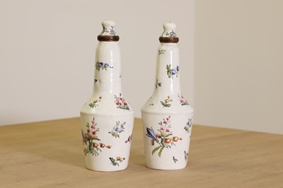 Lot 429 - A pair of English enamel condiment bottles
