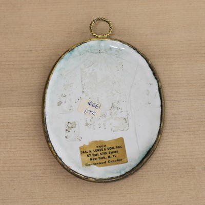 Lot 439 - An English enamel miniature portrait medallion