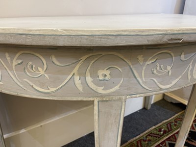 Lot 491 - A pair of Swedish Gustavian-style painted demilune side tables
