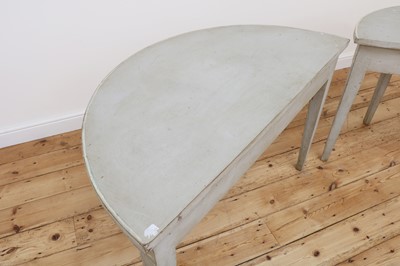 Lot 491 - A pair of Swedish Gustavian-style painted demilune side tables