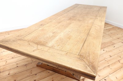 Lot 290 - A large blonde oak refectory table